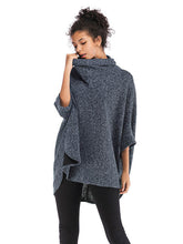 Suéter informal holgado de media manga con cuello alto y color liso